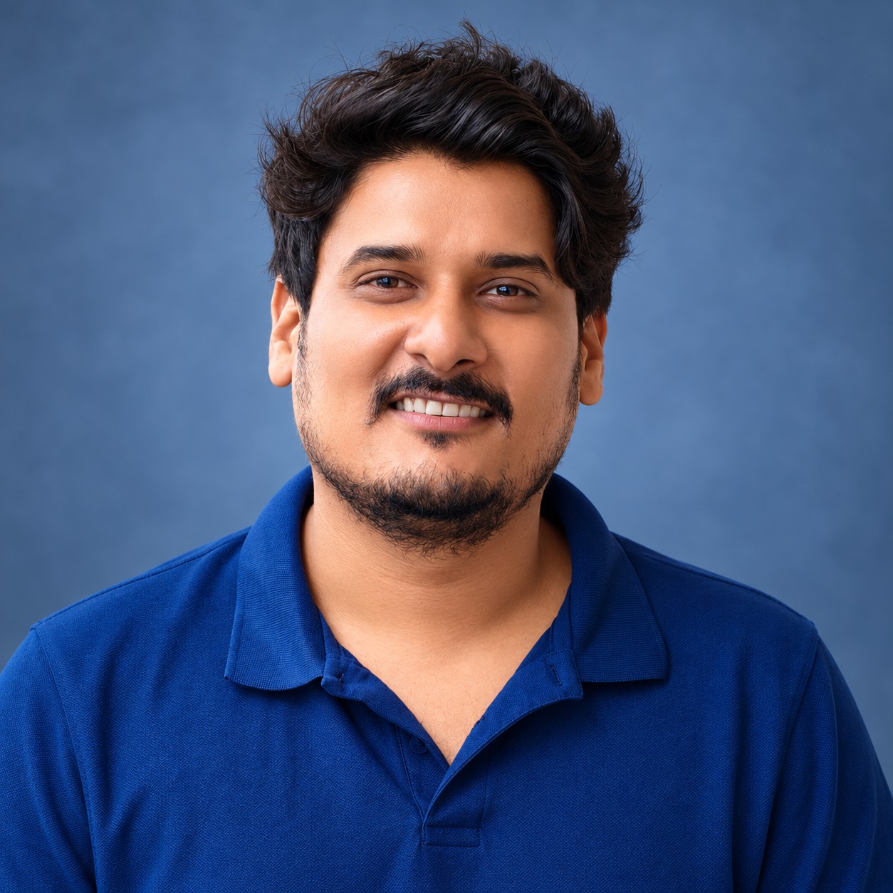 Exampay faculty member in a blue polo shirt